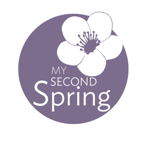 Purple logo with a white flower design and the text My Second Spring in elegant font.