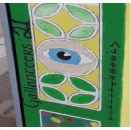 Colorful mural with eye design and abstract shapes, featuring text Gallanteers '21 vertically.